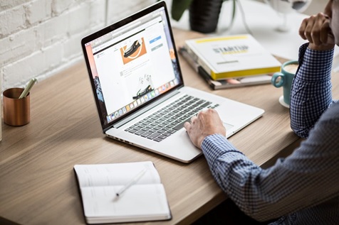 man browsing through a website